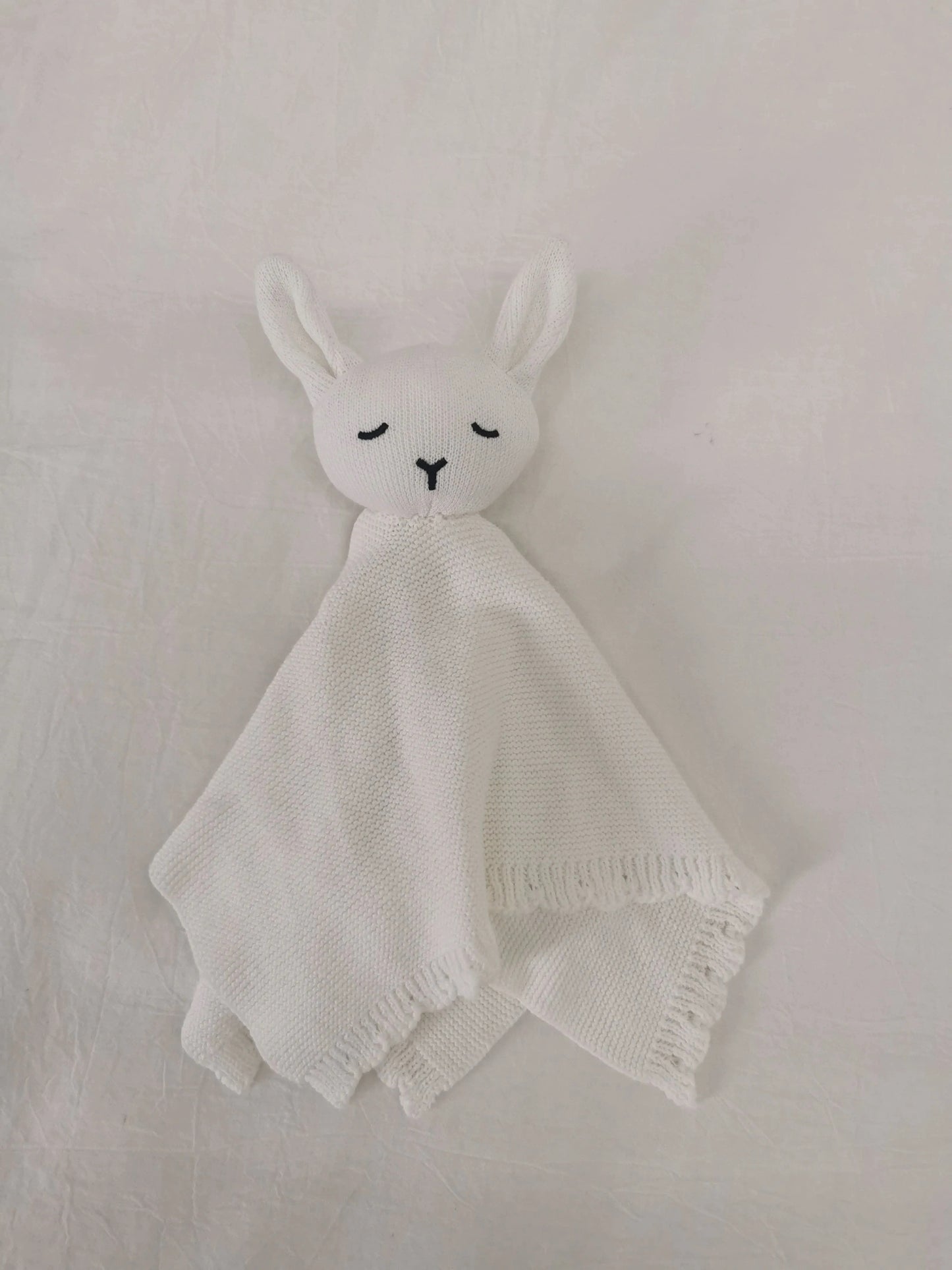 Off white knitted bunny comforter lovey blanket for newborn babies and baby gifts.