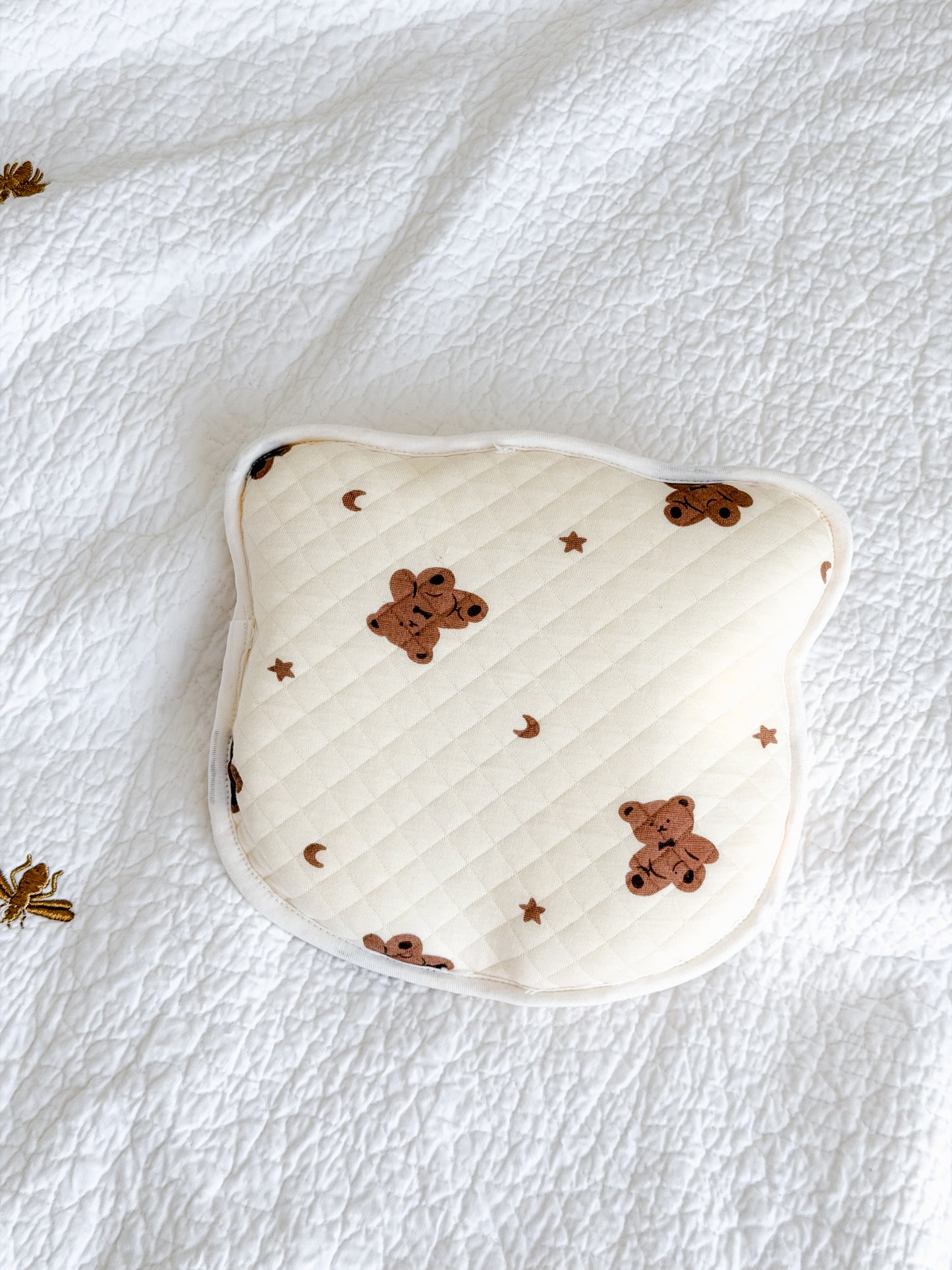 Anti-flat-head baby pillow with quilted cotton cover featuring teddy bear, moon and stars print — Maxims Gift Co. UAE
