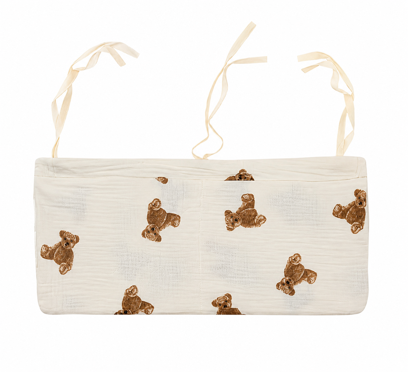 Bedside diaper organiser caddy in cream muslin with teddy bear print and tie straps — included in Maxims Gift Co. Hello Little Cub newborn gift box UAE
