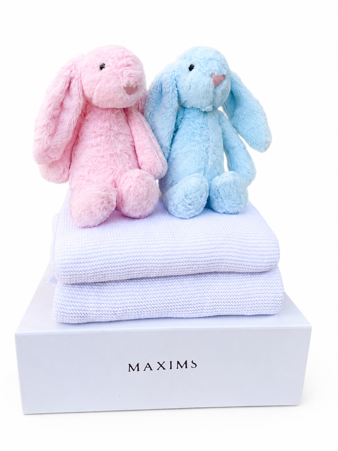 Boy and girl twin gift box with pink and blue plush bunnies on personalised white blankets — Maxims Gift Co. Dubai UAE
