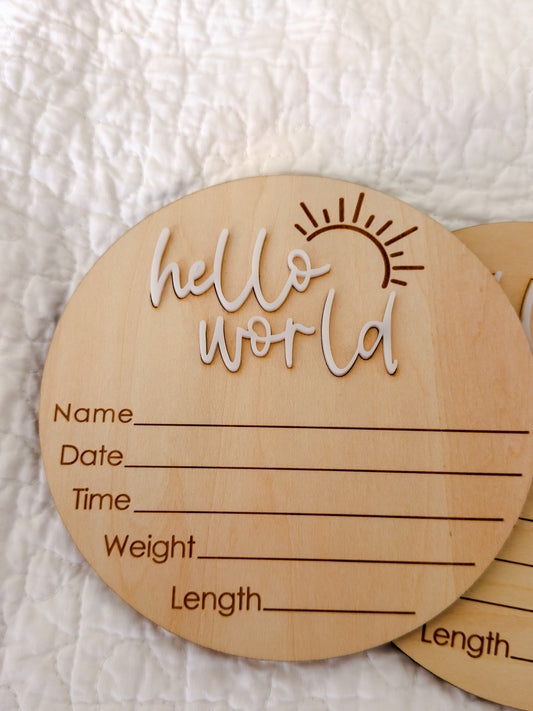 Wooden Hello World newborn milestone disc with engraved name, date, time, weight and length spaces — beautiful keepsake included in Maxims Gift Co. gift box

