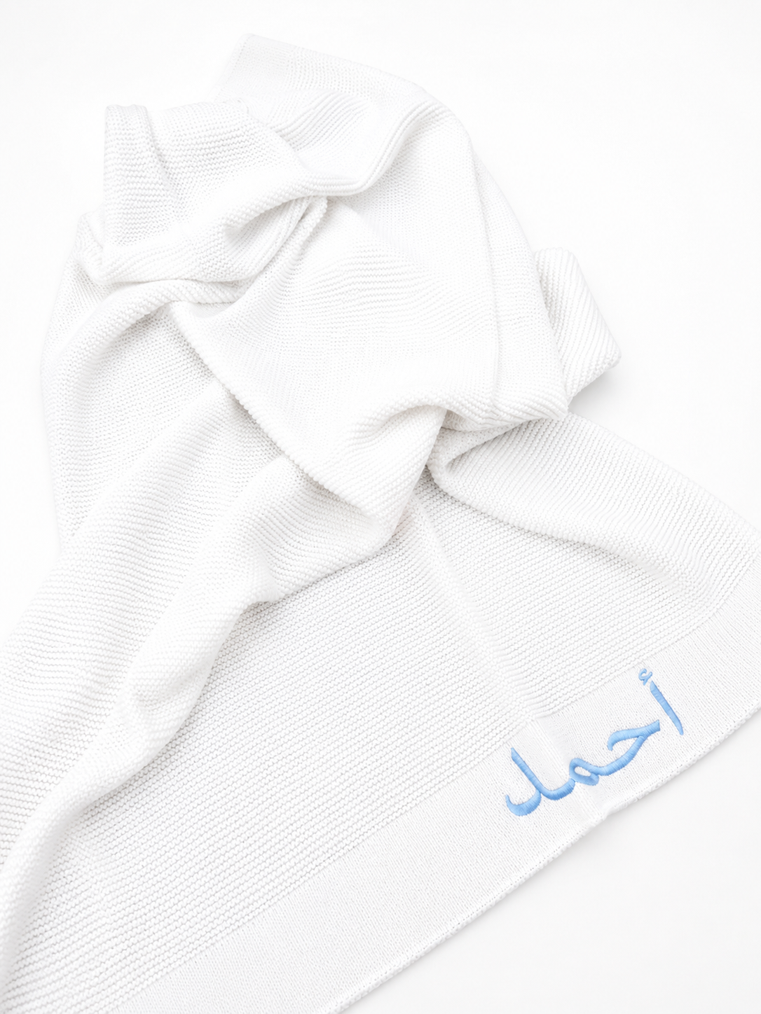 Personalised baby blanket showing thread colour options for name embroidery — Maxims Gift Co. customisation choices UAE

