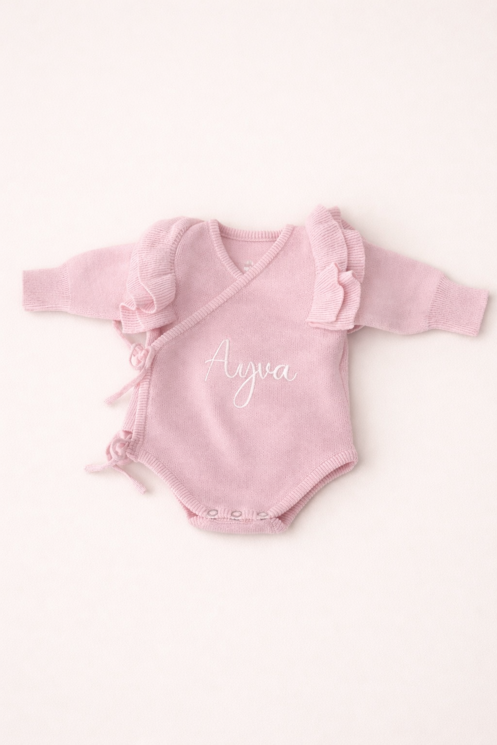 Personalised pink baby girl wrap romper with embroidered name 0-6 months — included in Maxims Gift Co. Little Lady gift box

