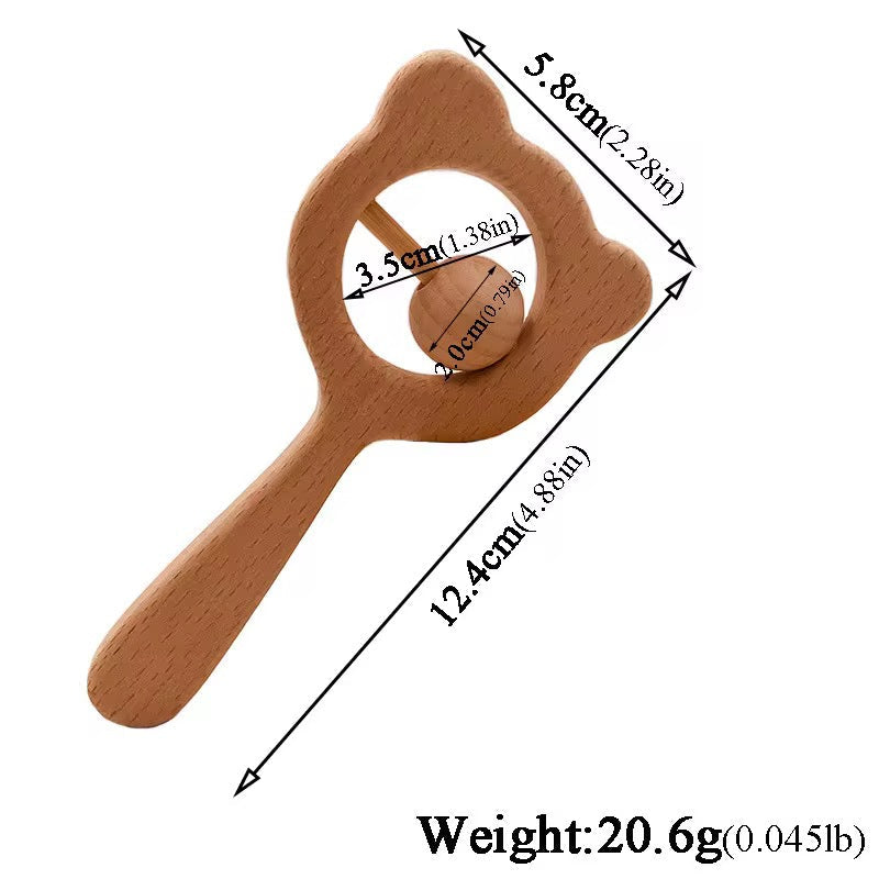 Personalised wooden baby rattle hand-engraved with baby's name — beechwood keepsake by Maxims Gift Co. Dubai UAE
