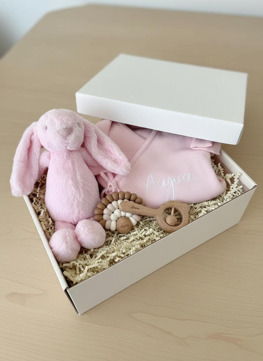 Pink personalised baby girl gift box with plush bunny, wrap romper, teether and rattle — Maxims Gift Co. Little Lady collection Dubai UAE

