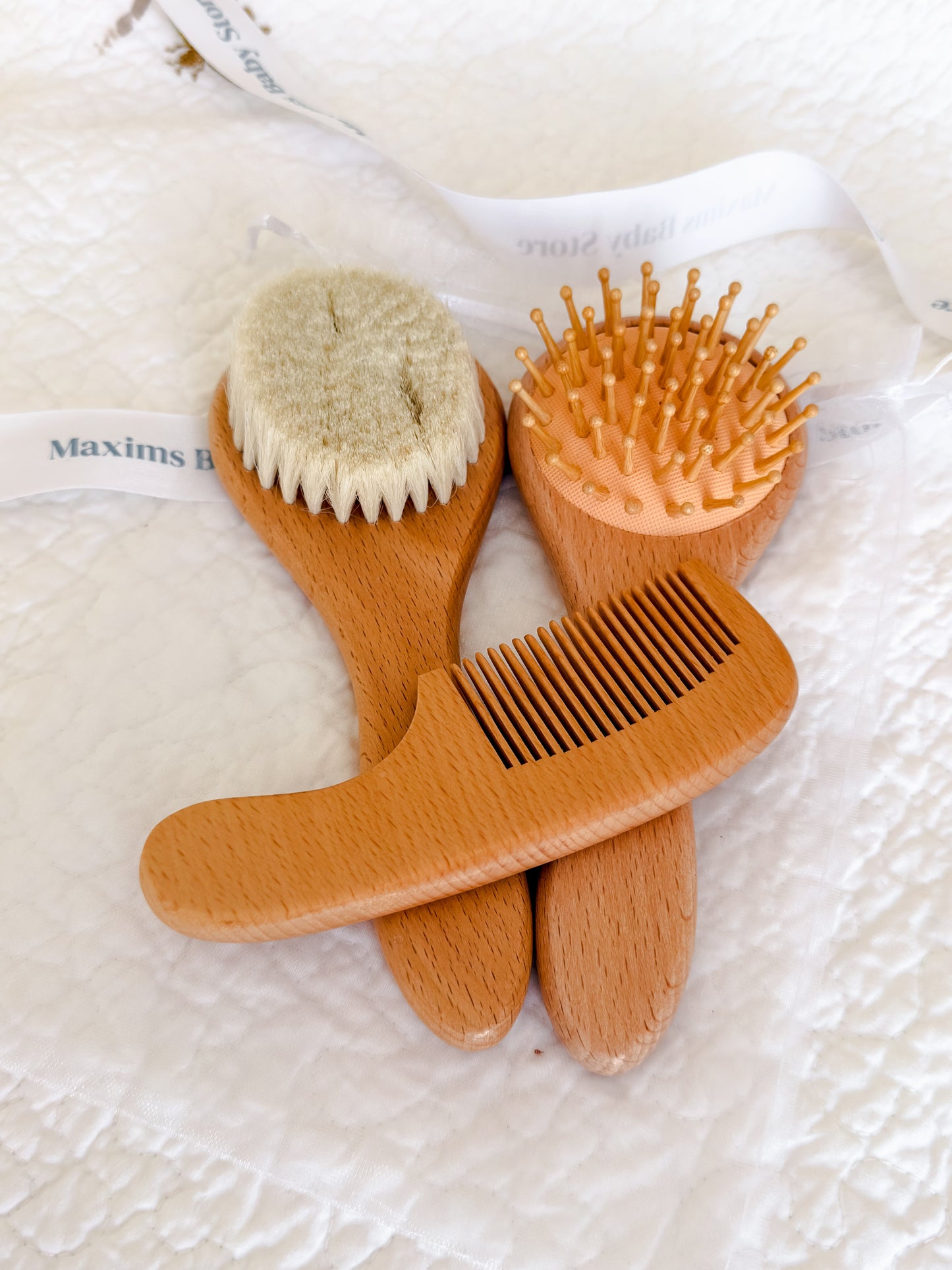 3-piece beechwood baby brush and comb set in teddy bear drawstring pouch — included in Maxims Gift Co. Hello Little Cub gift box
